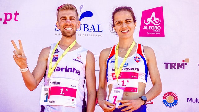 A man and a woman after winning a race